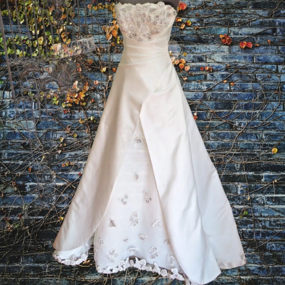 Maggie Sottero Ivory Strapless Ball Gown Wedding Dress with Beaded Bodice - Picture 5 of 8